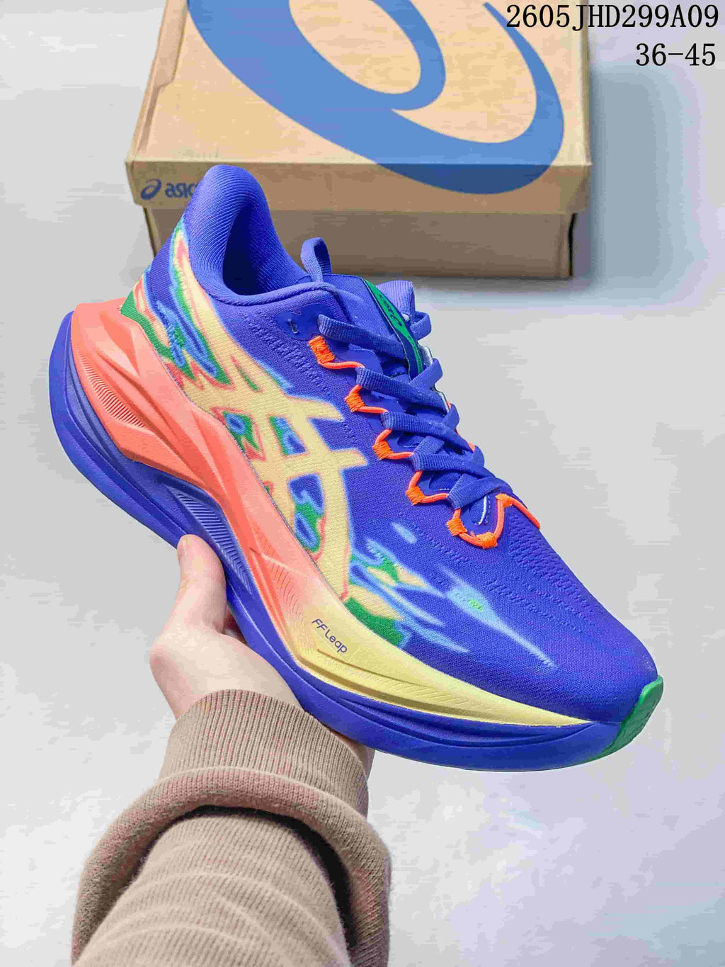 Blue ASICS Superblast 3 running shoe with bright multicolor accents