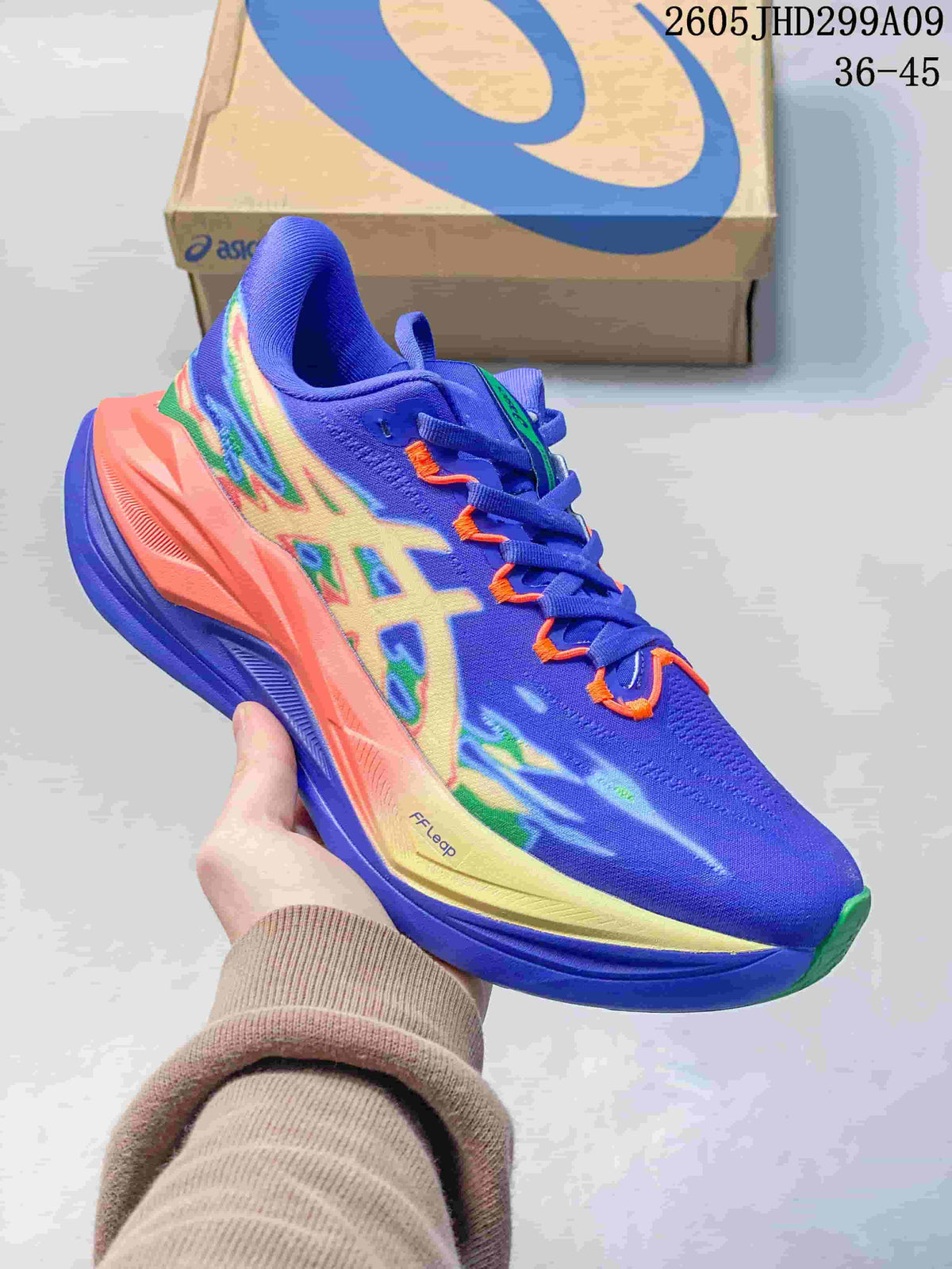 Blue ASICS Superblast 3 running shoe with bright multicolor accents