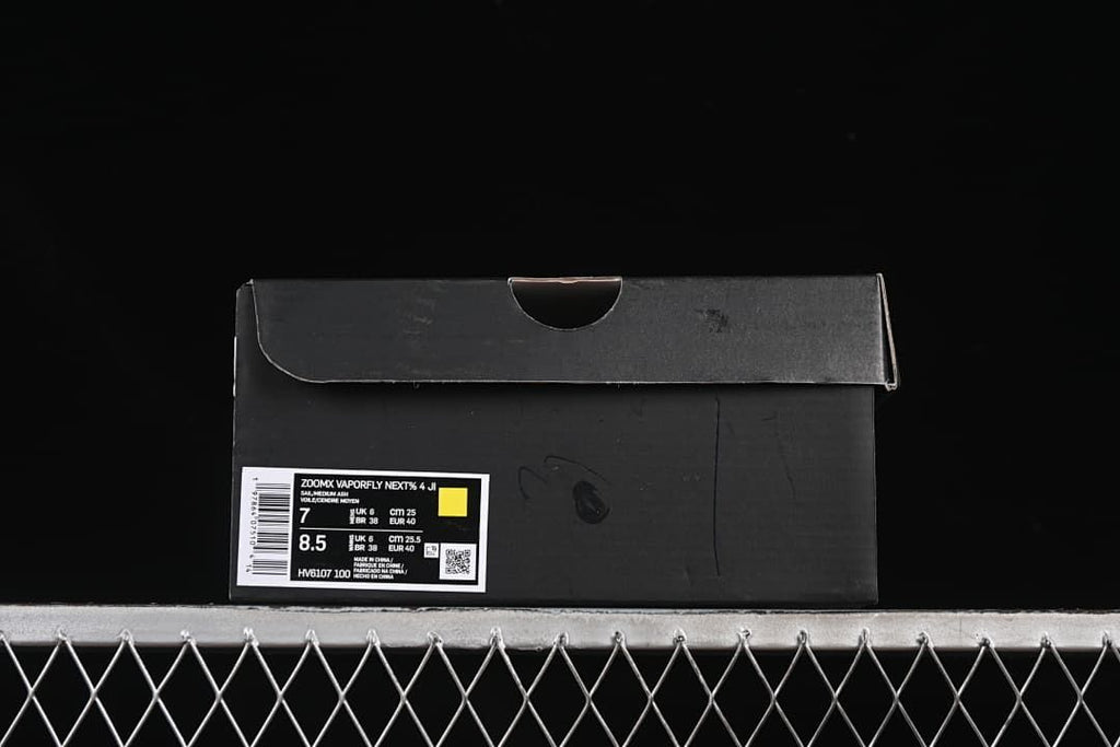 Black shoe box with a product label identifying the model and sample sizes