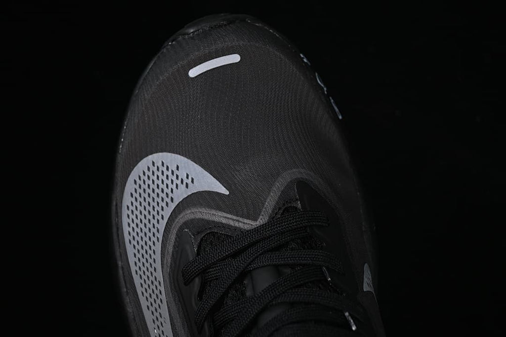 Top view of the toe box and laces with a light-colored Swoosh
