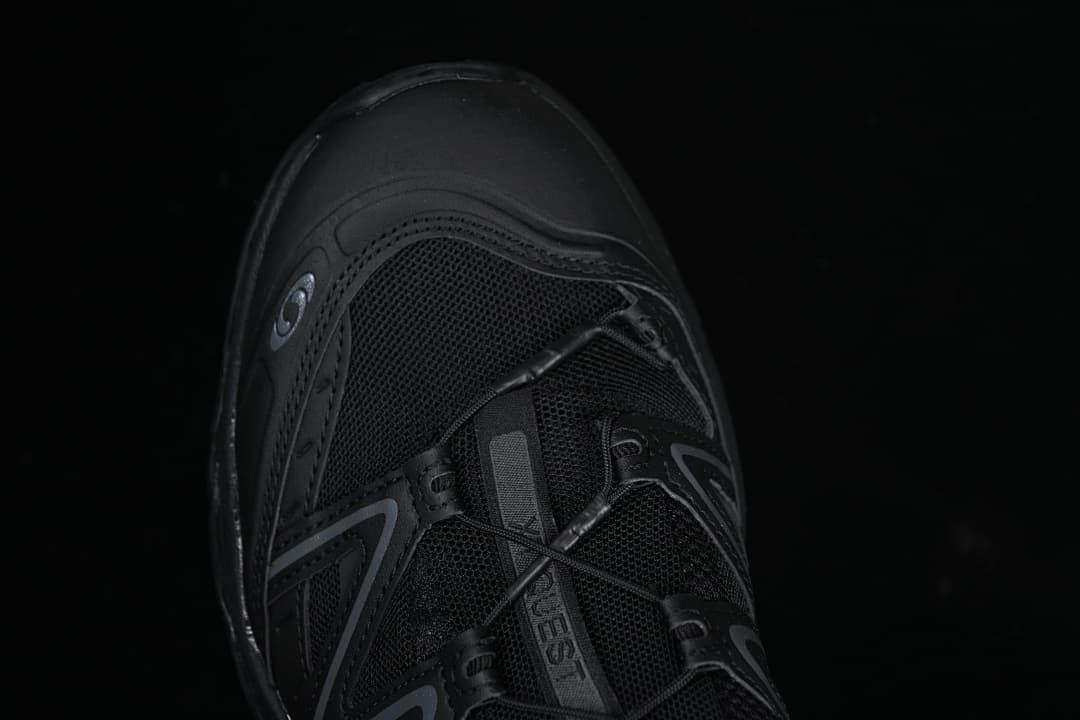 Top-front view of the toe, mesh panels, and lacing.