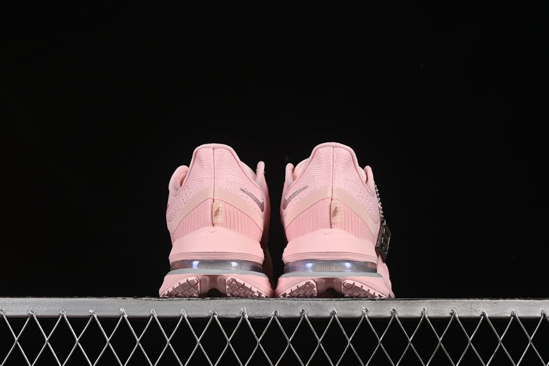 Rear view of both shoes showing heels and visible cushioning units