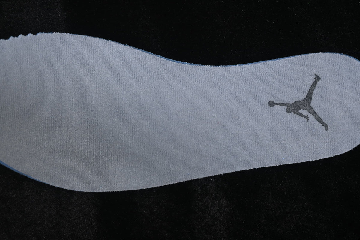 Grey shoe insole with a Jumpman logo.