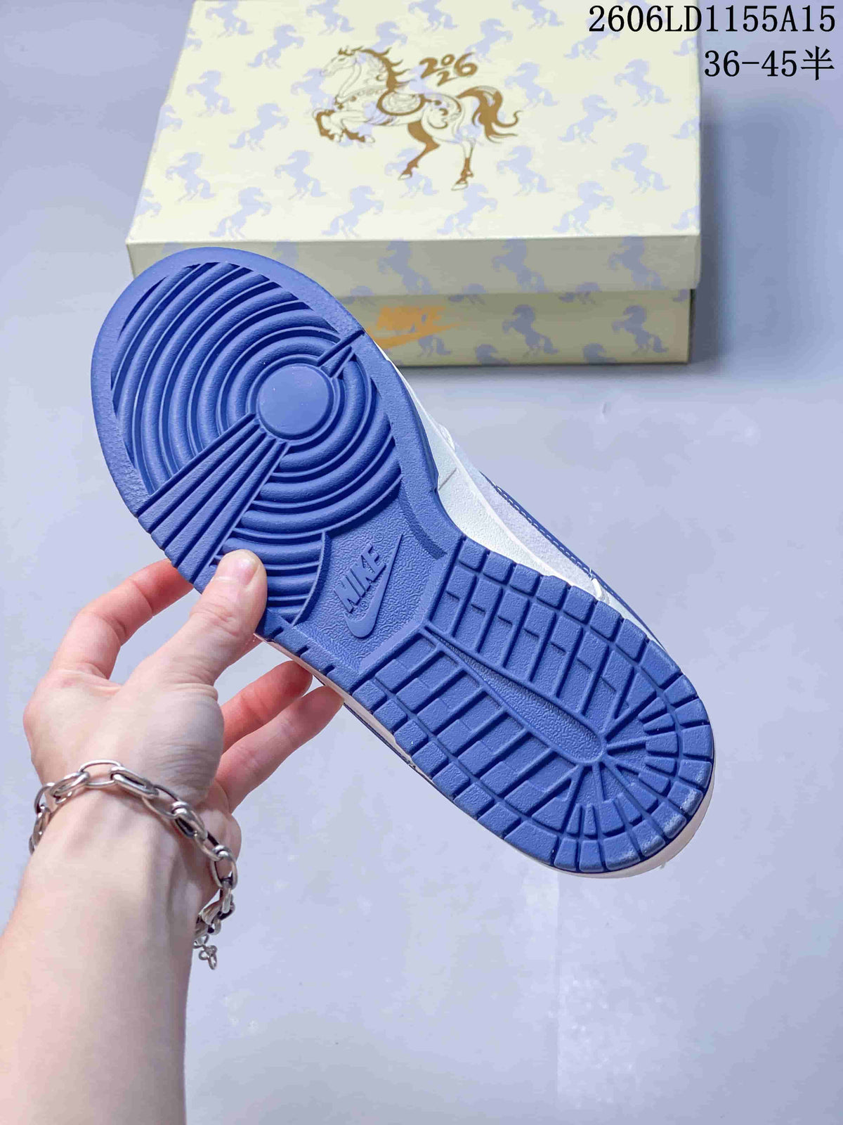 Blue outsole of the sneaker with patterned box in the background