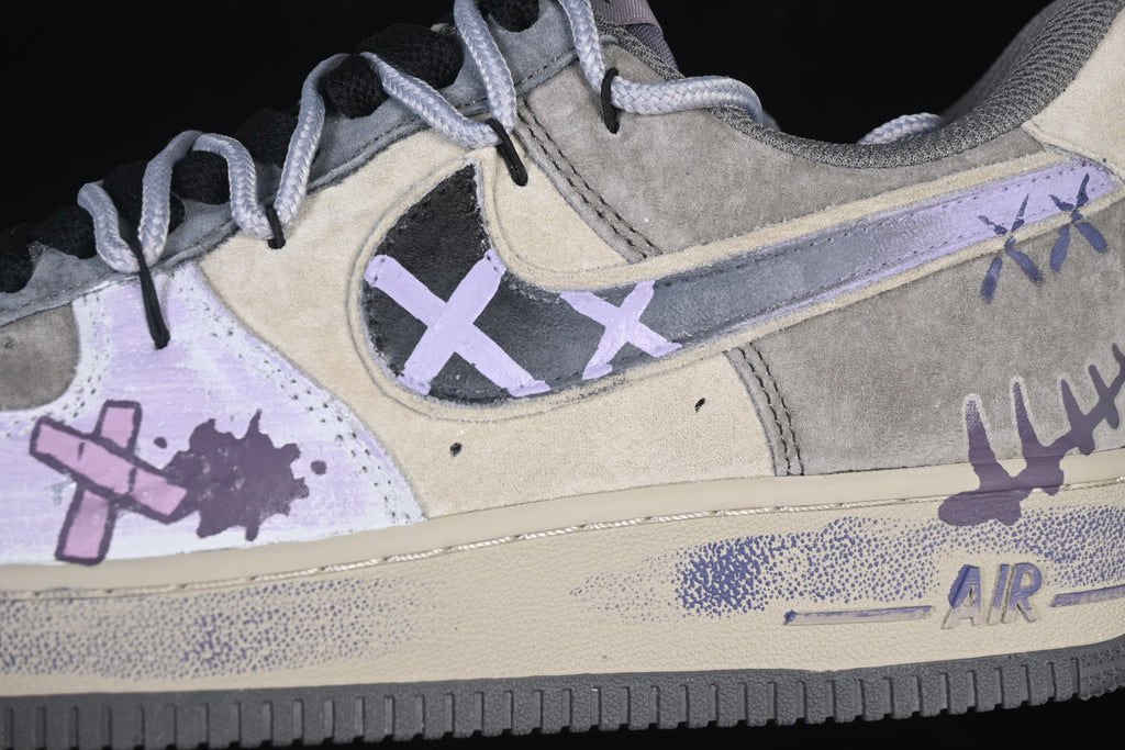 Side detail showing lavender swoosh and graffiti-style bandage artwork