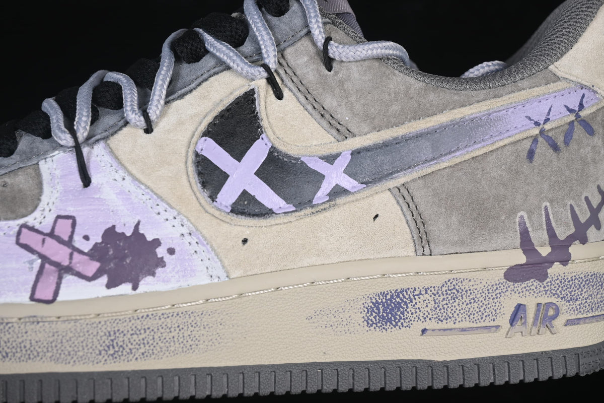 Side detail showing lavender swoosh and graffiti-style bandage artwork