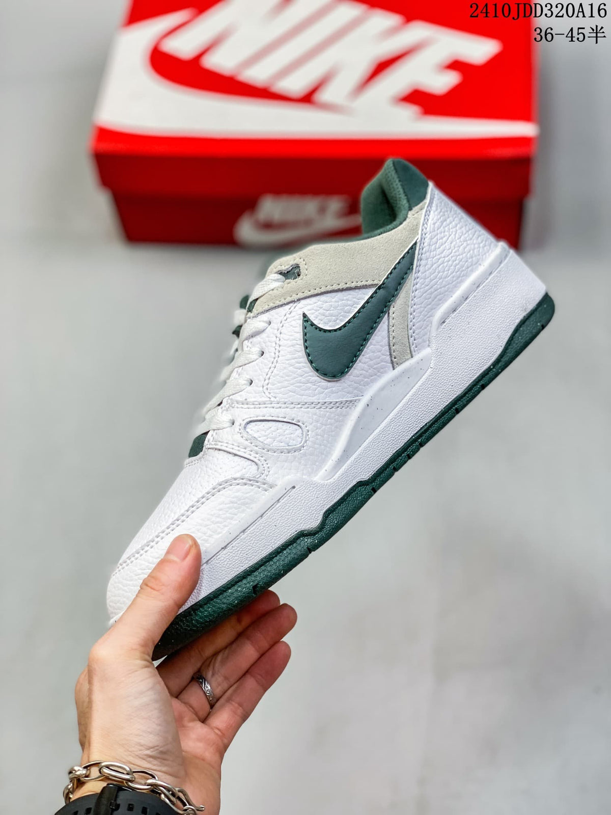 Side profile of a white Nike Full Force Low sneaker with dark green Swoosh and outsole
