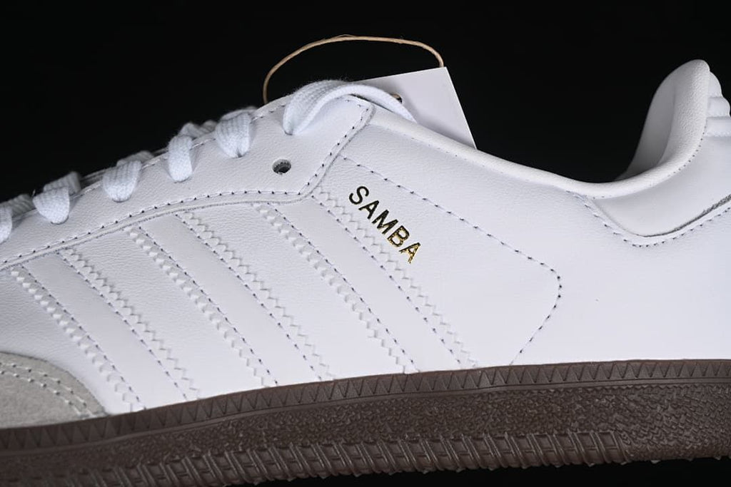 Close-up of the white side panel, three stripes, and Samba lettering