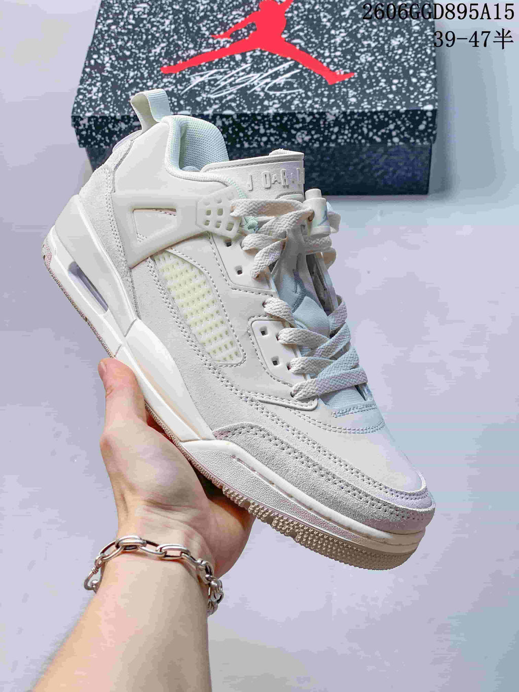Close-up side view of a light-colored Jordan Spizike Low sneaker
