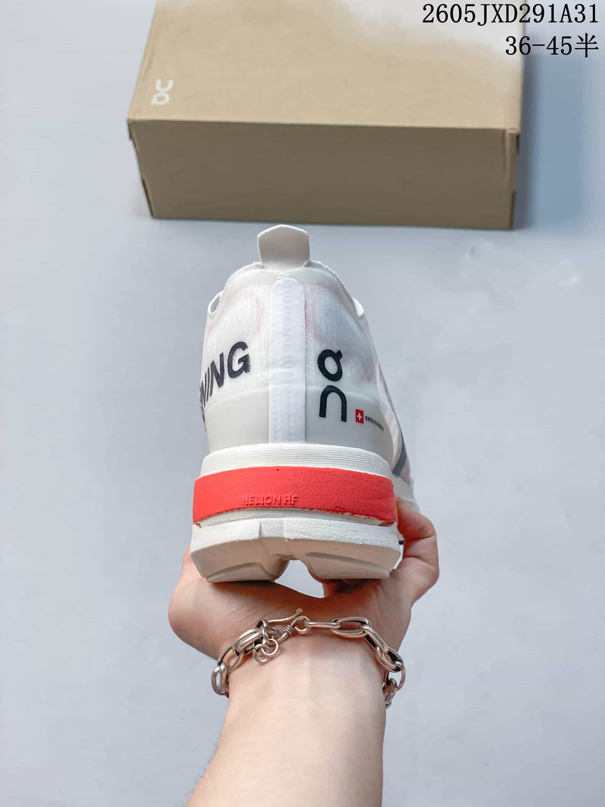 Rear view of the shoe with a coral-colored heel section