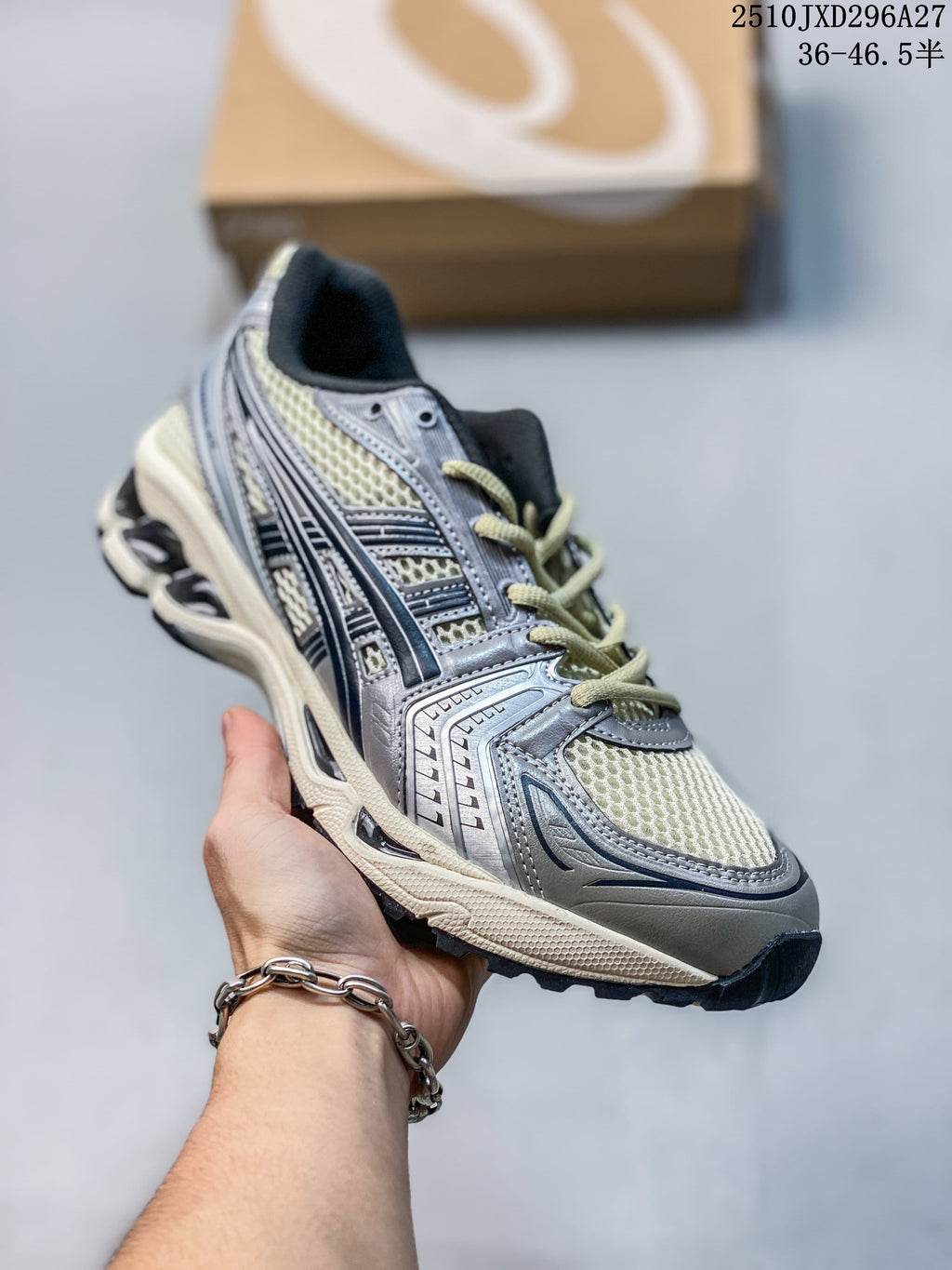 Light neutral mesh running sneaker with silver overlays and dark accents.