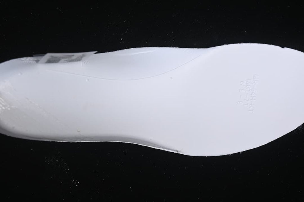 Close-up of the shoe outsole in white.