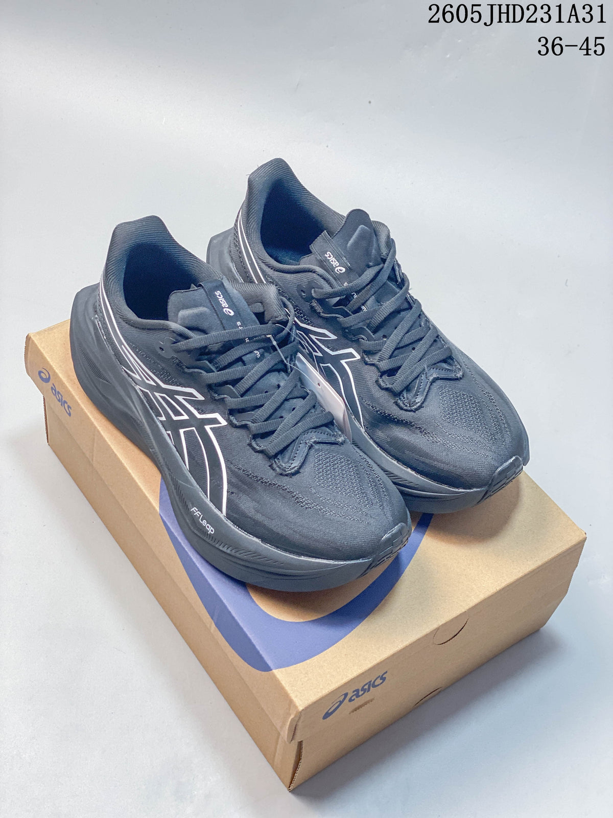 Dark gray ASICS MEGABLAST running shoes shown on a shoebox