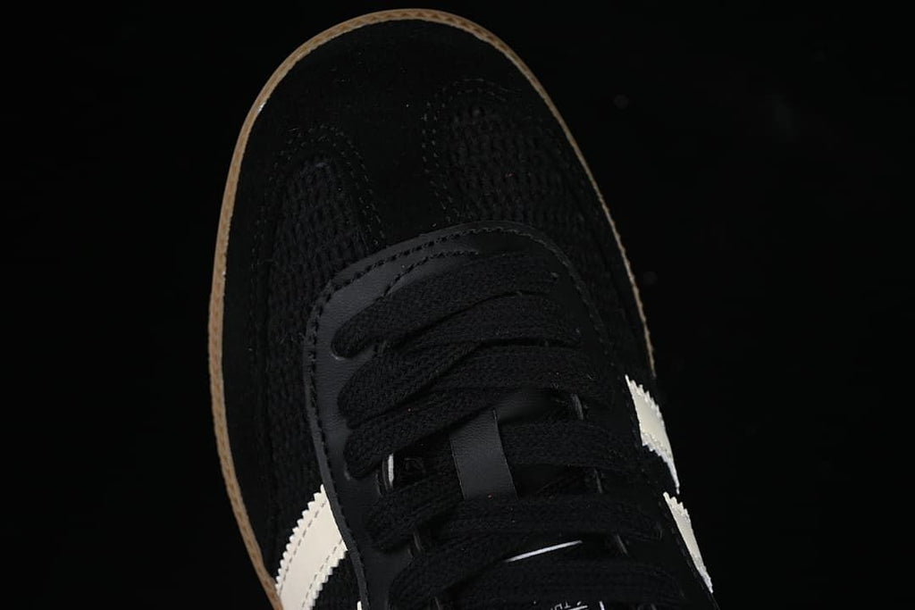 Top view of the black toe and lace-up front