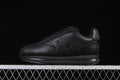 Black low-top sneaker shown from the side