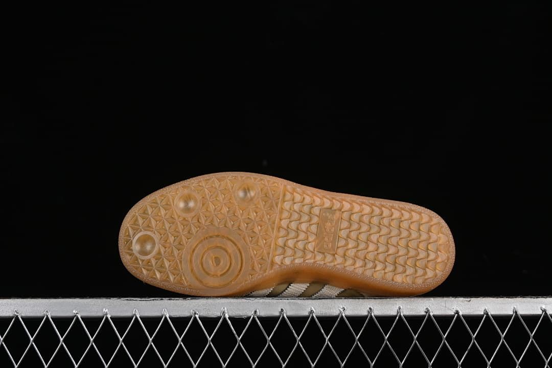 Underside view of the gum-colored outsole and tread pattern