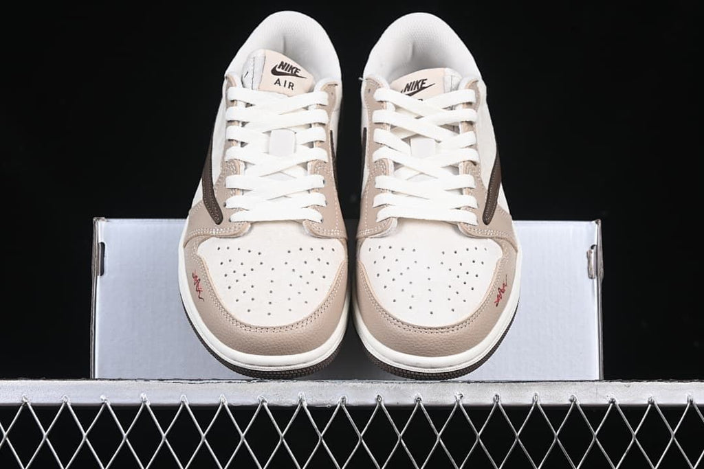 Front view of the pair with perforated toe boxes and white laces.