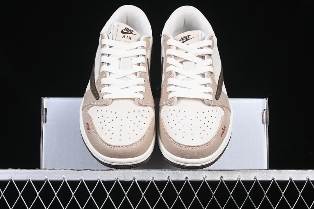 Front view of the pair with perforated toe boxes and white laces.