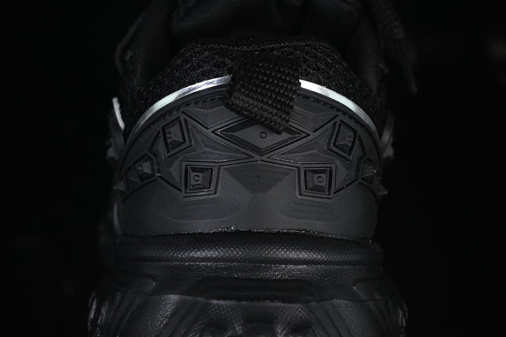 Close-up of the black heel and sculpted rear sole.