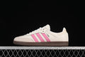 Side view of an off-white adidas Samba OG sneaker with pink stripes and a gum outsole
