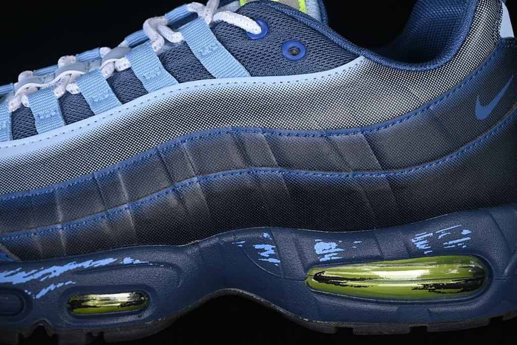 Close-up of layered blue side panels and visible Air units
