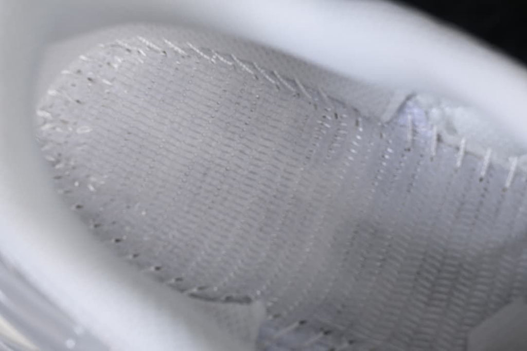 Close-up of the sneaker's interior mesh lining