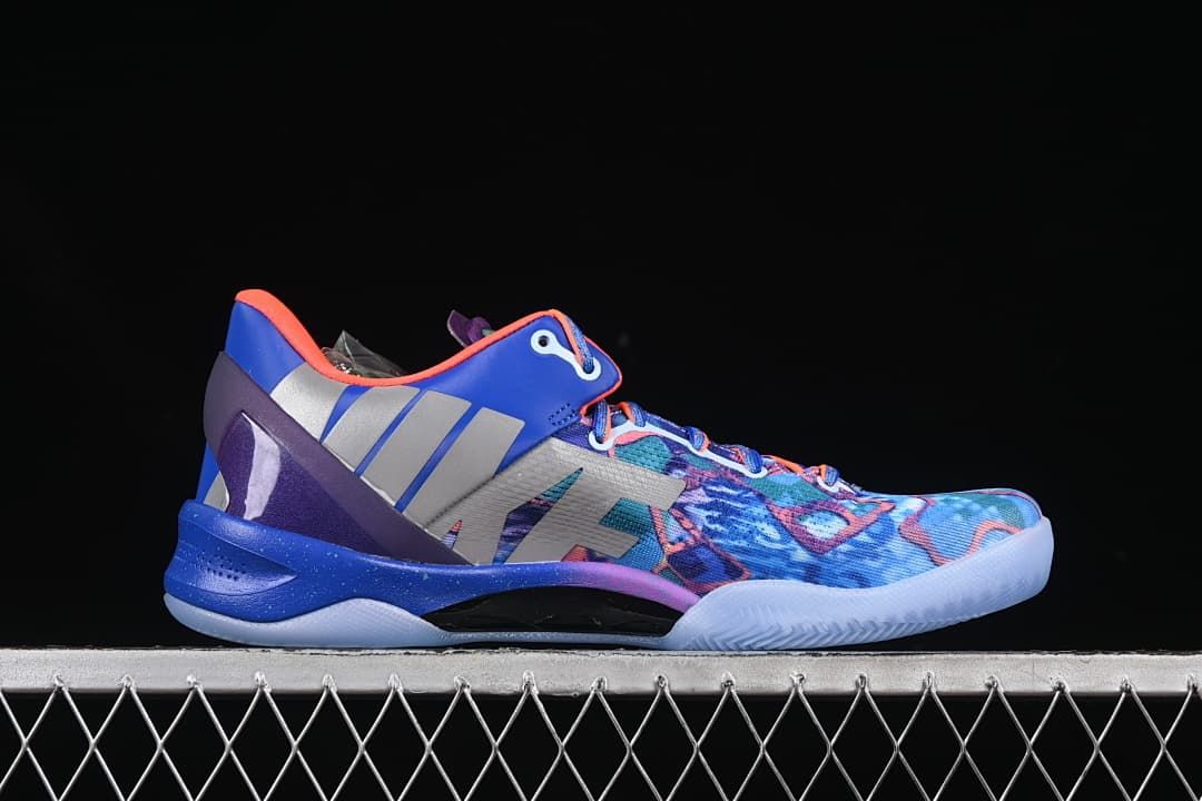 Side profile of blue multicolor Kobe basketball shoe with translucent outsole