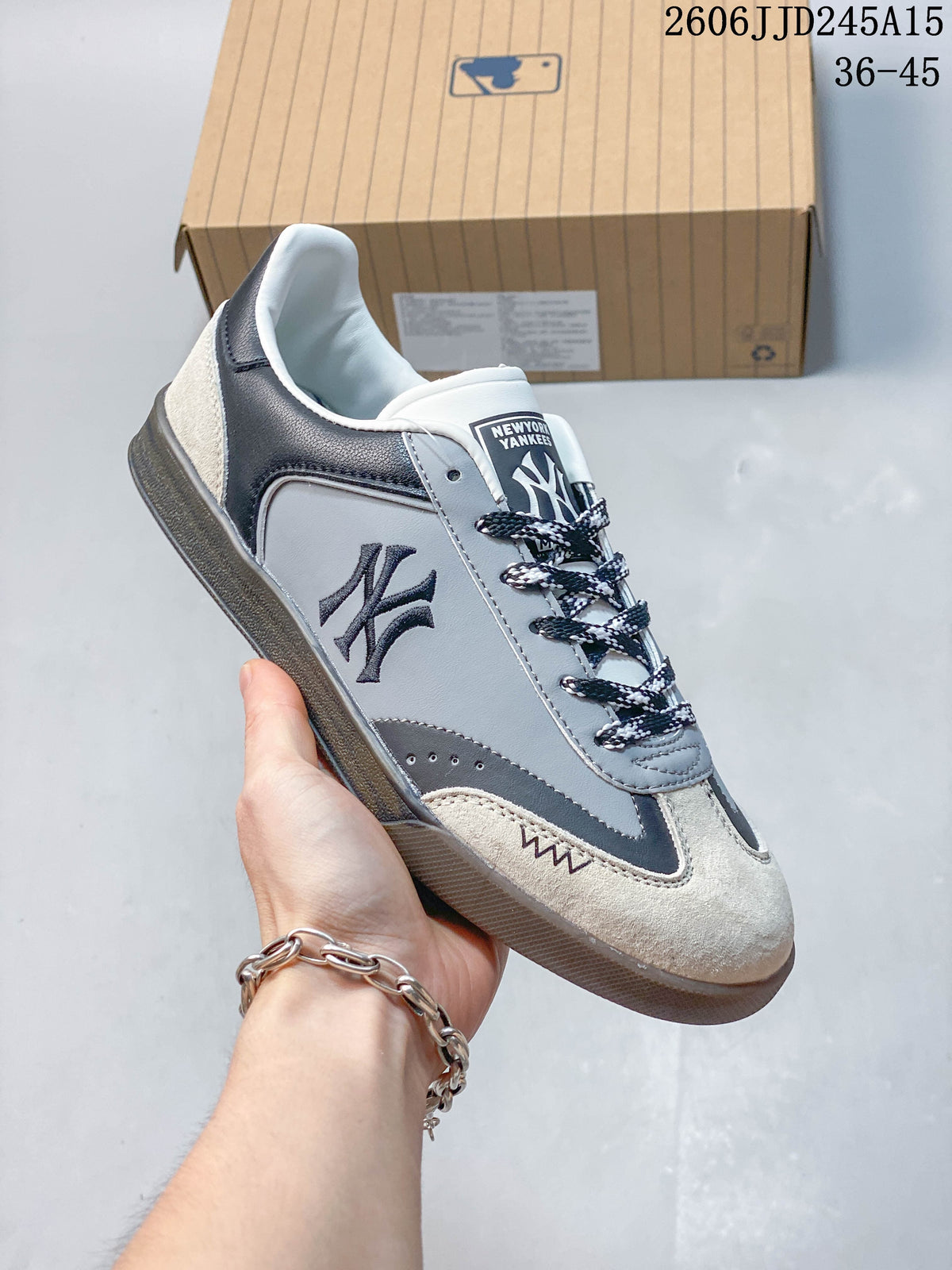Gray, navy, and cream New York Yankees low-top sneaker