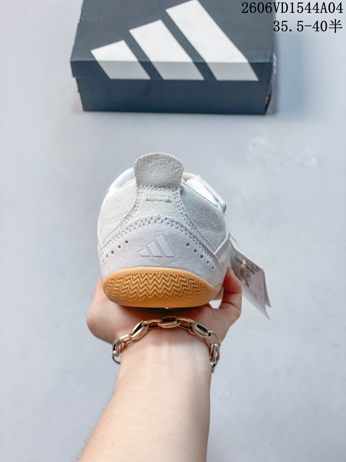 Rear view of the adidas Urban Reverie sneaker showing the heel and gum-colored outsole