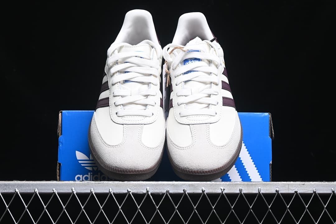 Front view of the pair showing white laces and toe overlays