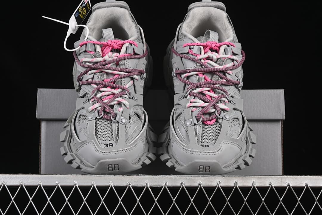 Pair of grey Track sneakers viewed from the front