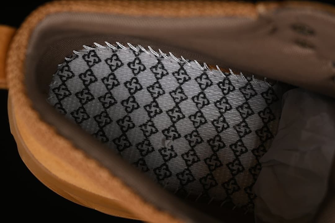 View inside the boot showing patterned lining