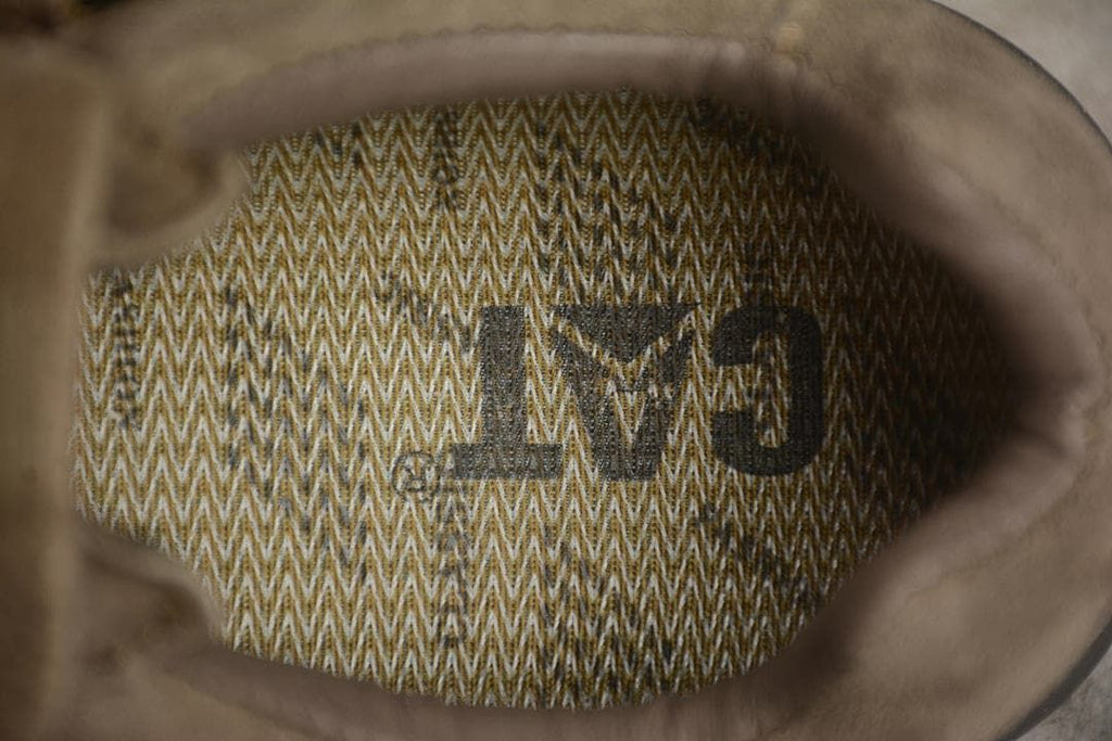 Close-up of the patterned interior lining and CAT marking.