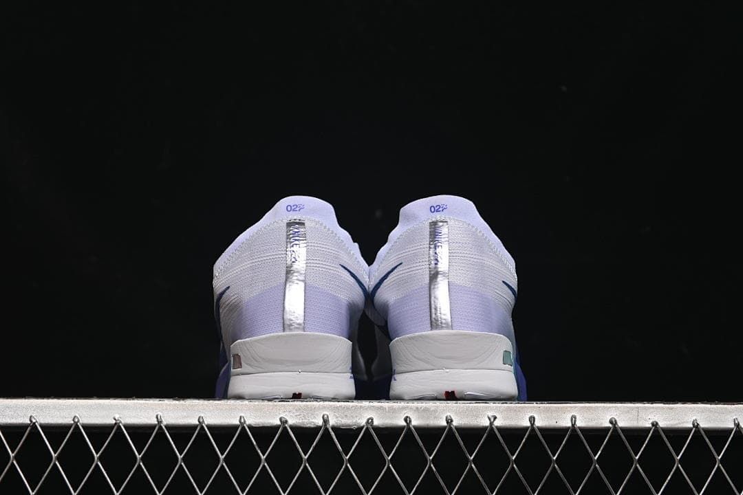 Rear view of both shoes showing the heel details.