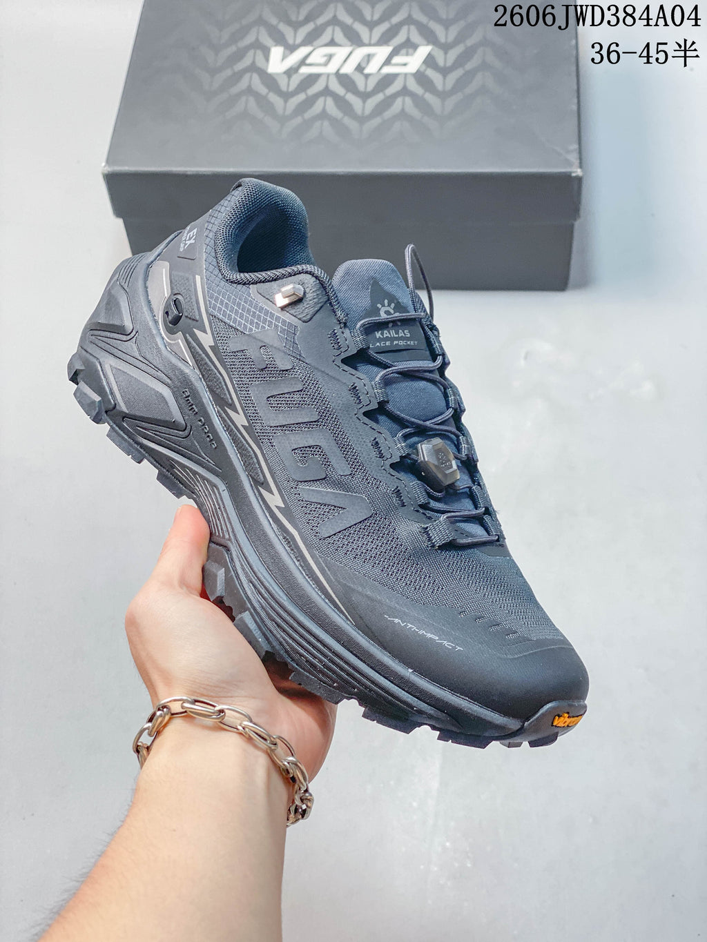 Angled view of a gray KAILAS FUGA EX3 shoe with rugged outsole