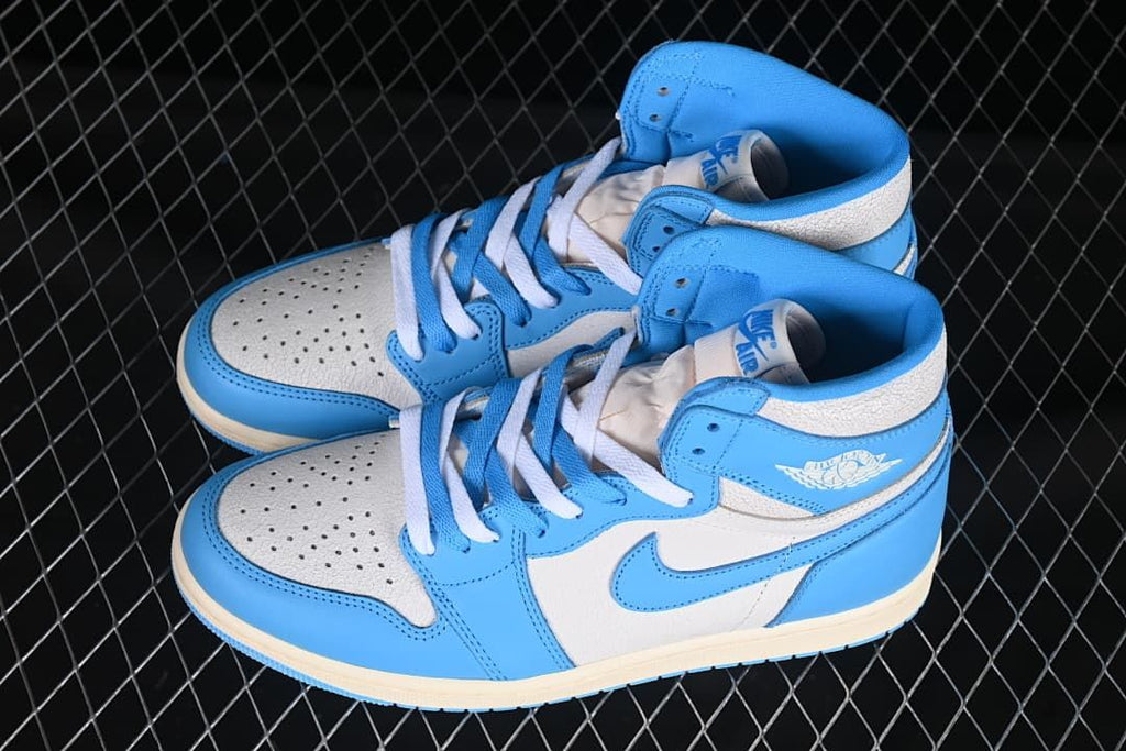 Pair of blue-and-white high-top sneakers shown from above