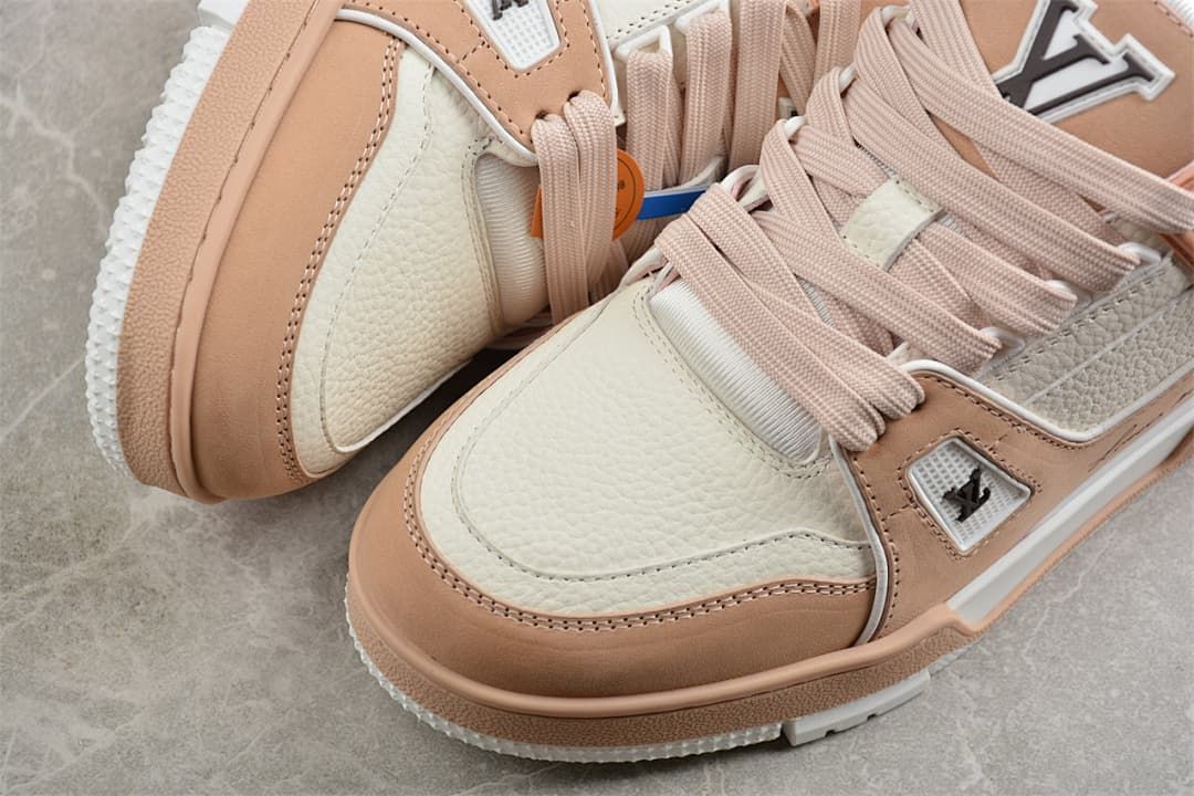 Close-up of the textured toe panels and layered pink overlays