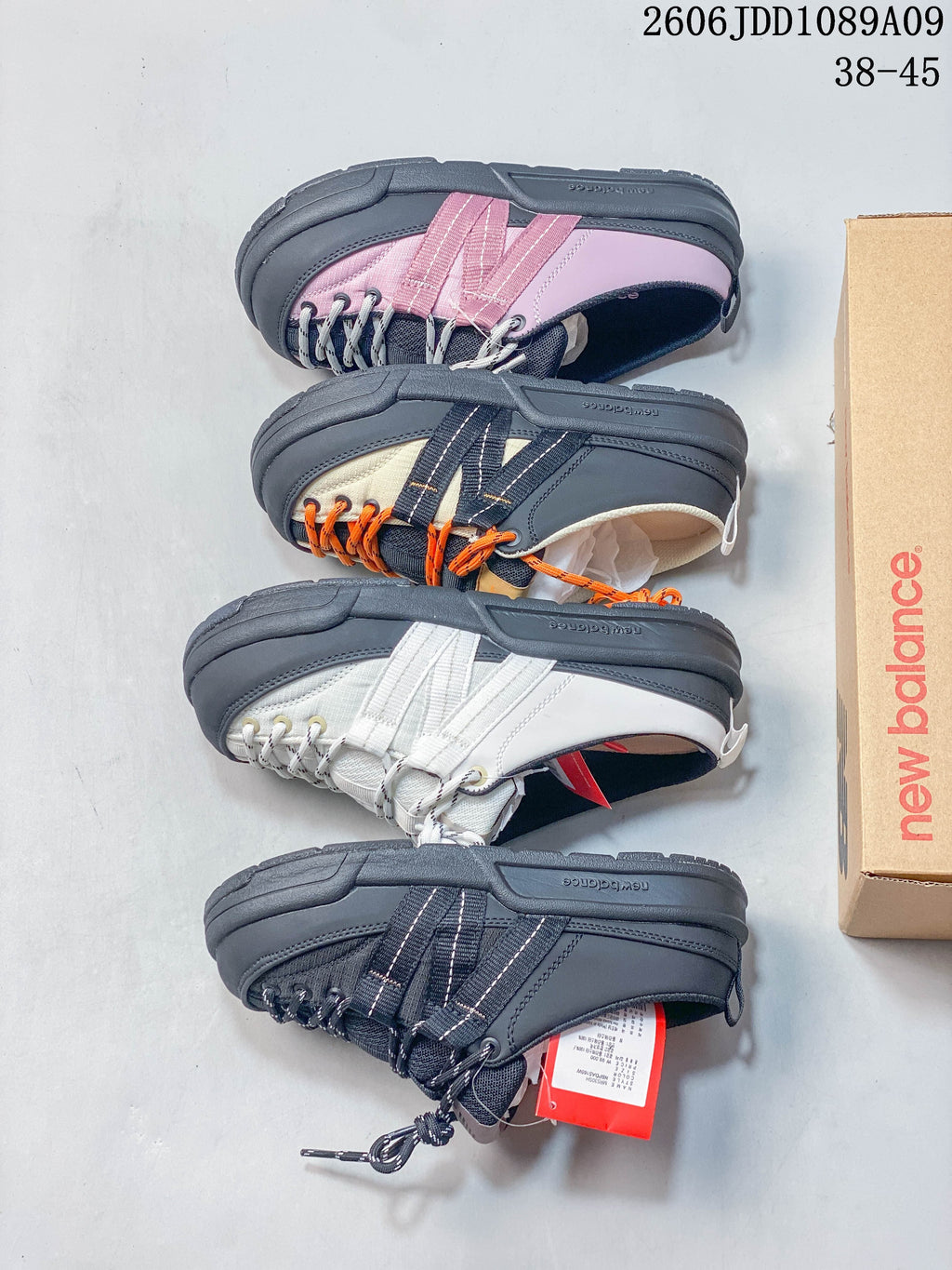 Side view of four New Balance Terrace Mule shoes in different color combinations.