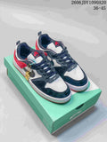 Pair of black, white, and red Nike SB Alleyoop low-top sneakers on a green shoebox