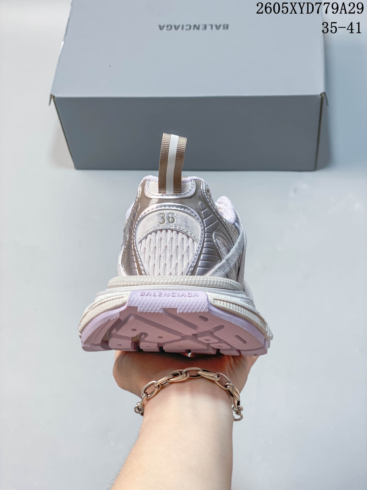 Rear view of a sneaker showing the heel and size marking 36