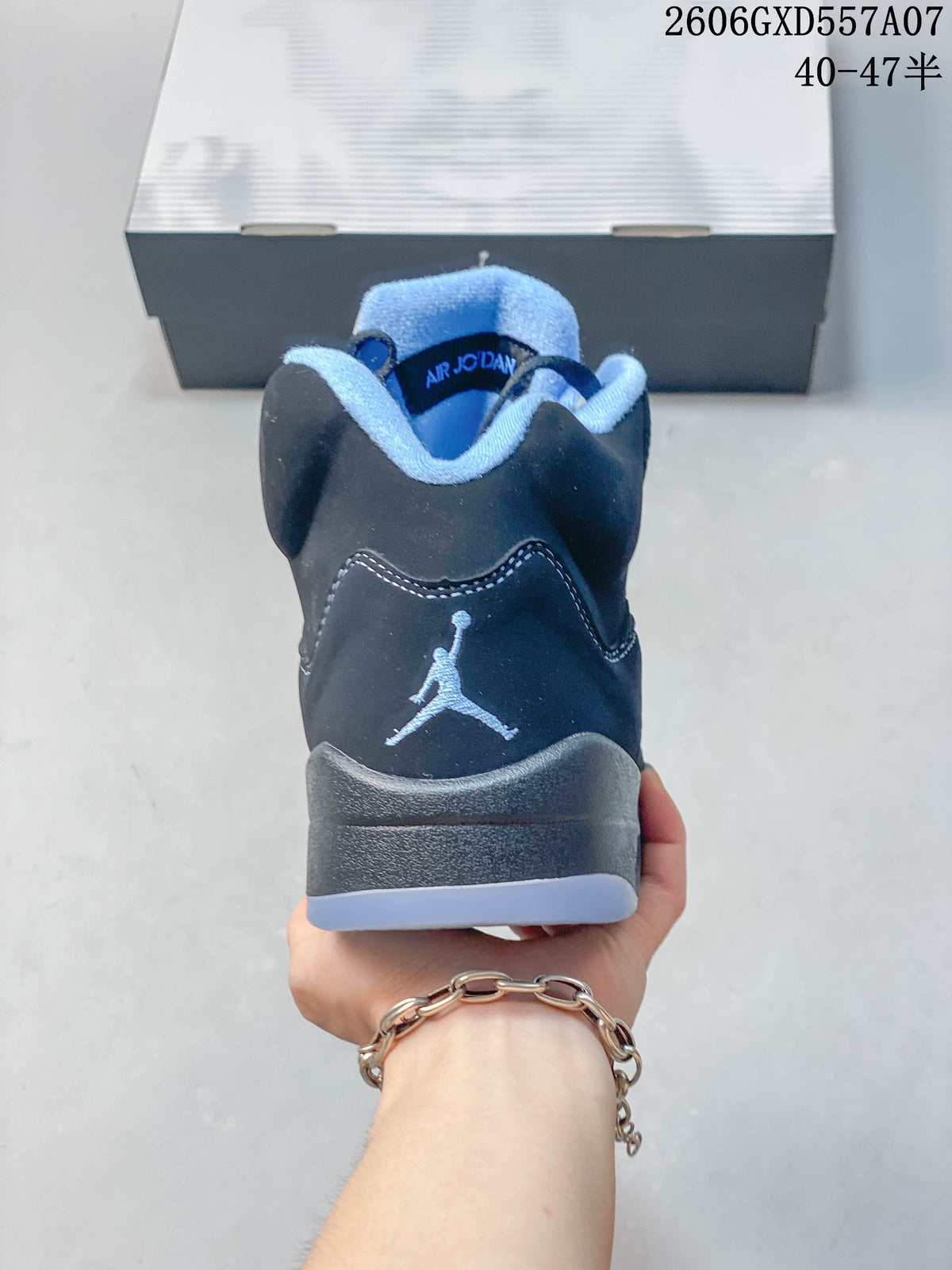 Rear view of a Jordan Air Jordan 5 sneaker showing the heel logo and light blue collar lining.