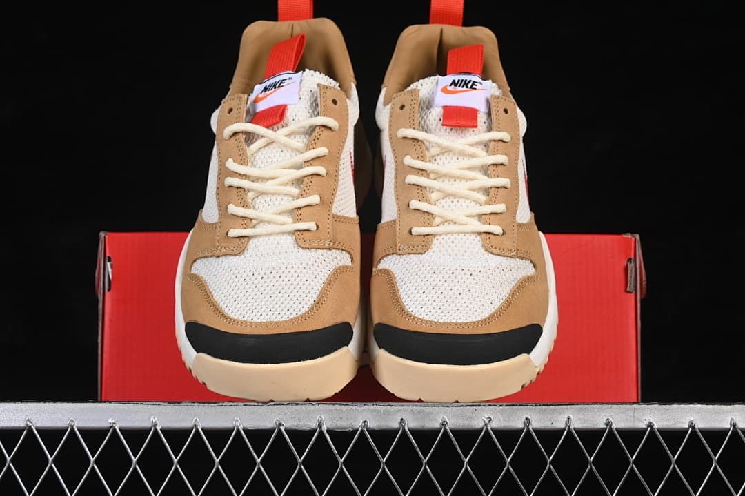 Front view of the pair showing mesh toe boxes, tan overlays, and black toe accents