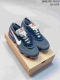 Pair of dark gray Nike Air VaporMax sneakers with white Swooshes and translucent soles, shown on a box; image overlay states sizes 36–45.5.