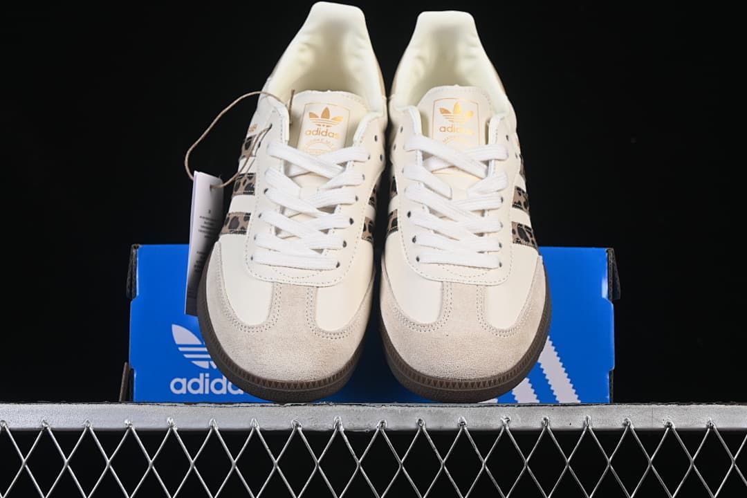 Front view of the pair showing the suede-look toe overlays and lace-up fronts