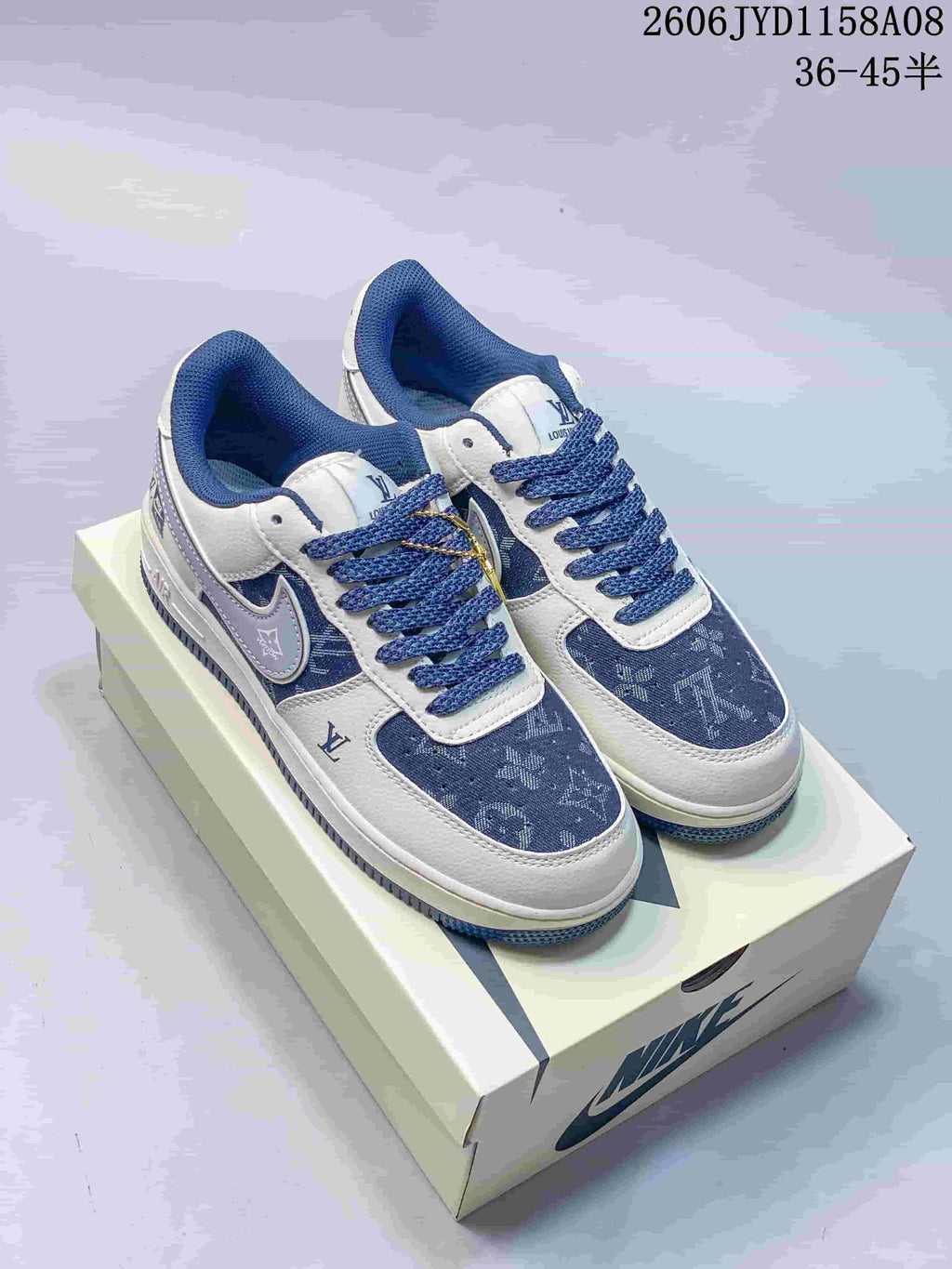 Pair of blue and white patterned Nike Air Force 1 '07 Low sneakers on a shoebox