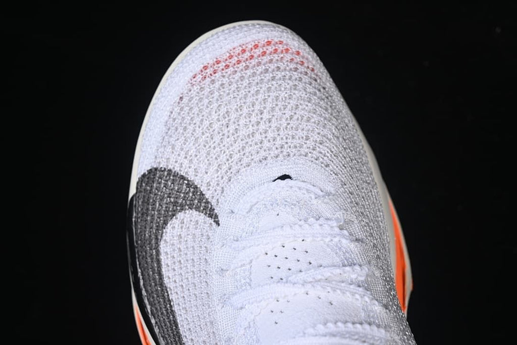 Top view of the knit sneaker toe and laces