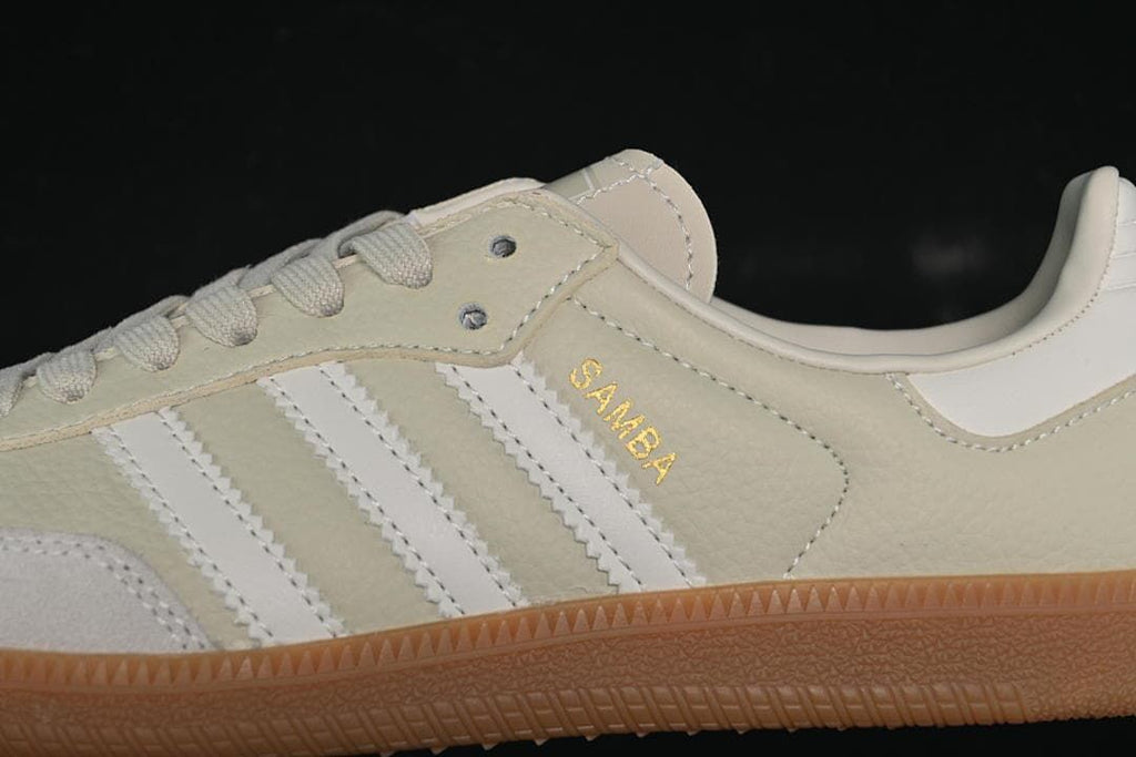 Close-up of the side stripes and gold-tone Samba lettering.