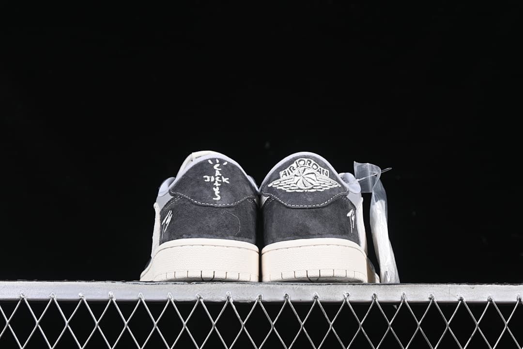 Rear view of both shoes with contrasting heel embroidery