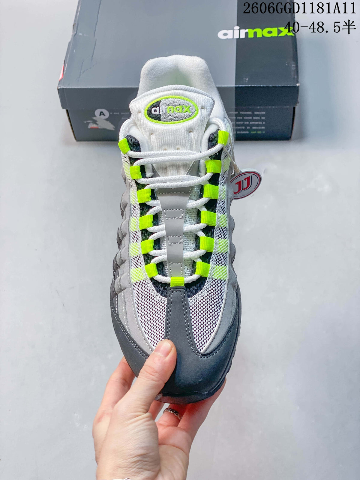 Front view showing the white mesh toe, grey overlays, and volt lace accents.