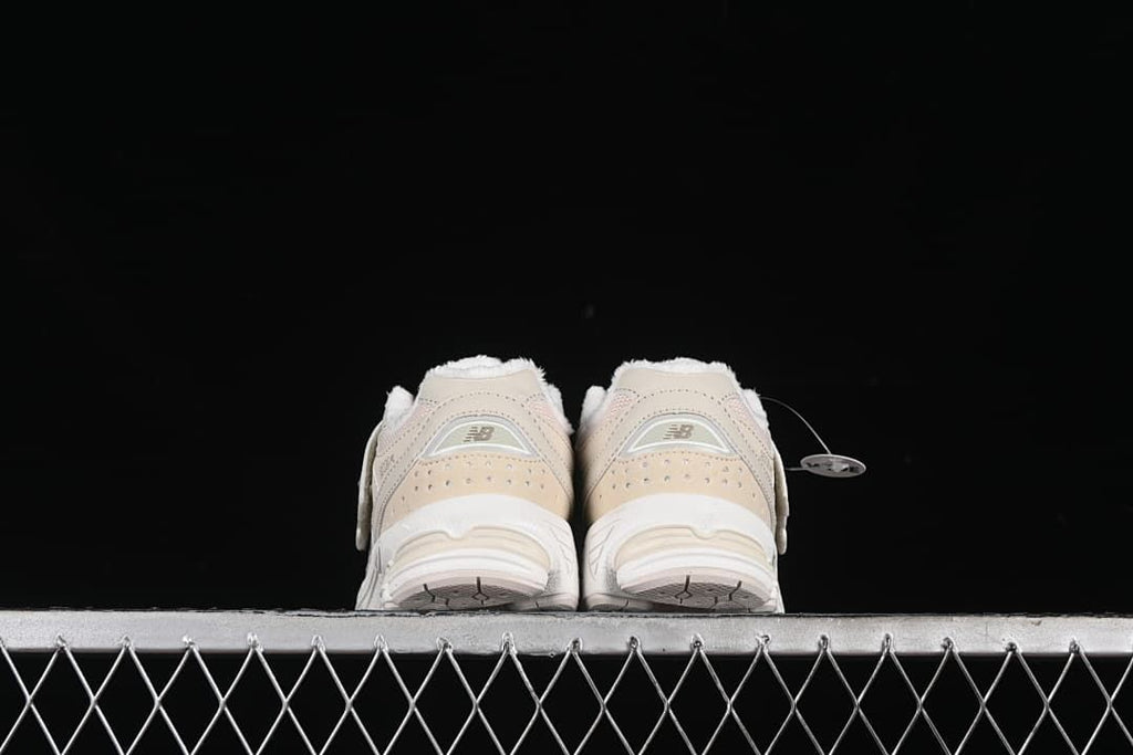 Rear view of the pair showing heel panels and soles